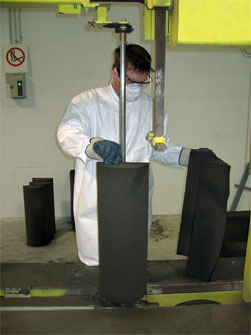 Cutting Foamglas® pipe covering.
